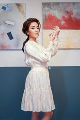 Silk midi skirt with soft pleats and elastic waist for a fluid, feminine silhouette